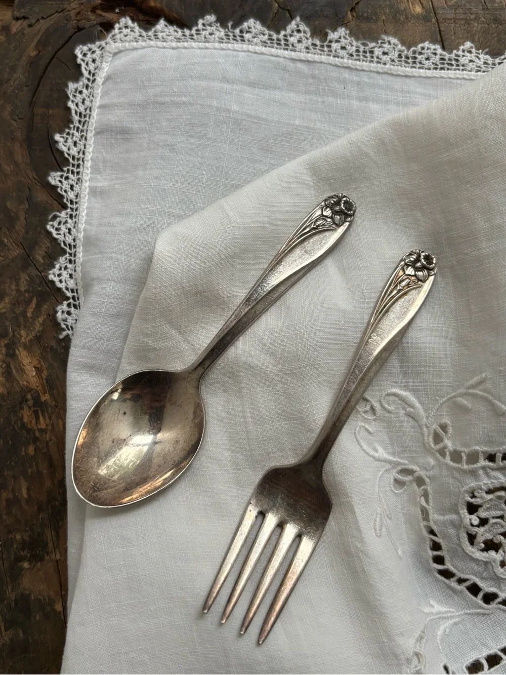 Vintage silver plated baby spoon and fork with embossed daffodil. Rogers Bros